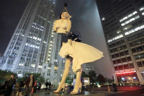 A 26-foot tall statue of Marilyn Monroe is separated for disassembly in Chicago, May 7, 2012. The sculpture "Forever Marilyn" by artist Seward Johnson, is based on a scene from the movie "Seven Year Itch" was taken down after being on display since last July.